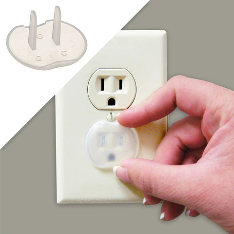 Baby Safe Outlet Covers 36 Pack For Easy Home Protection being placed into electrical socket, demonstrating durable childproofing.