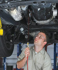 Mechanic using All-In-One ATF Refill Kit For MV7201 Fluid Extractor With Brass Ball Valve And Quick-Change Coupler under vehicle