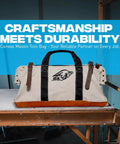 Heavy Duty Canvas Tool Bag 24 Inch Wide With Reinforced Frame And Suede Leather Bottom on a workbench, front view