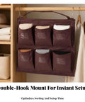 Slick Heavy Duty Six Pocket Hanging Closet Organizer With Reinforced Carry Handle And Breathable Storage Slots For Streamlined Wardrobe Sorting And Daily No Stress Organization In Matte Black, featuring double-hook mount.