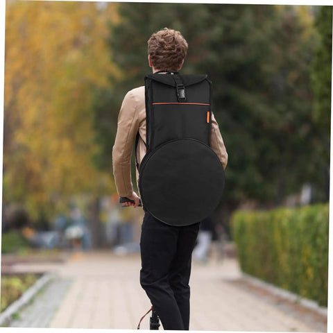 Premium Drum Pad Storage Bag Featuring Slick Waterproof Fabric Cover And Smart Mesh Accessory Organizer Pouch For Snare Stand Gear Gig Ready Hella Durable Travel Case, carried by a person on a path.