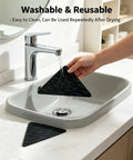 Washing a black triangular pad from Eight Piece Triangle Rug Pads Set 70x70mm No Slip Dual Sided Adhesive Pads For Hardwood Floors.