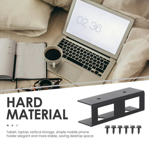 Super Tight Black Steel Laptop Stand With Storage Tray For Sick Desk Setup, Heavy Duty Under Desk Computer Mount Rack For Study Room, Ultimate Workspace Organizer And Sleek Riser next to a laptop on a desk with coffee and notebook.