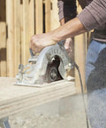 Professional Grade Hardcore 15 Amp Worm Drive Circular Saw With 8 1/4 Inch Blade cutting through wood with precision.