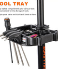 Tool tray on Ebike Repair Stand For Home Shop And Mechanics Heavy Duty Bike Workstand with tools and compartments visible