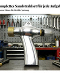 Heavy Duty Sandblasting Machine Handheld With Aluminum Alloy Build And Brass Hardware For Automotive Restoration on workshop table.