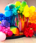 Awesome Assorted Rainbow 5 Inch Latex Balloons 100 Pack For Birthday Bash And Wedding Decor in vibrant party arch setup.