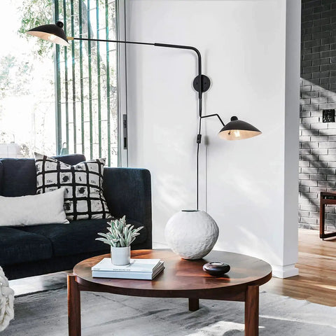 Retro Dope Plug In Wall Sconce With Swivel Arm And Adjustable Head in living room next to sofa, industrial black metal light.