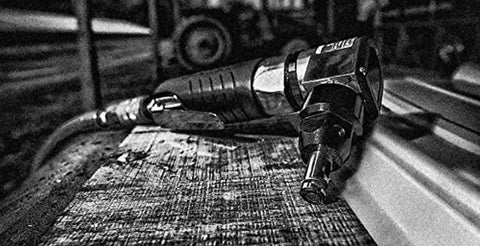 Air Nibbler With Angled Head 4200 SPM Front Exhaust Cuts Up To 18 Gauge Steel Aluminum Or Plastic Ergonomic Grip Laying on Wood Surface
