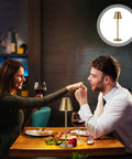 Couple dining with Cordless 2 Pack Desk Lamps With 5000mAh Rechargeable Battery And 3 Level Dimmable LED Night Light For Bedroom, Dining, And Restaurant Metal Bronze Finish No Cord Needed Portable Table Lamps