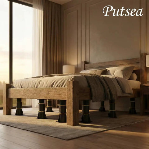 Rock Solid 4 Pack Adjustable Bed Support Legs 8.5 To 13 Inch Heavy Duty Center Support stabilizers under a wooden bed.