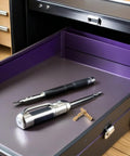Hidden Barrel Hinges For Jewelry Boxes And Keepsakes, Brass Cylindrical Design with tools on purple drawer surface