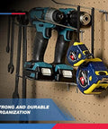 Power tools and tape measures on Six Inch Pegboard Hook Organizer Kit 50 Pack For Garage Wall Storage And Shelving