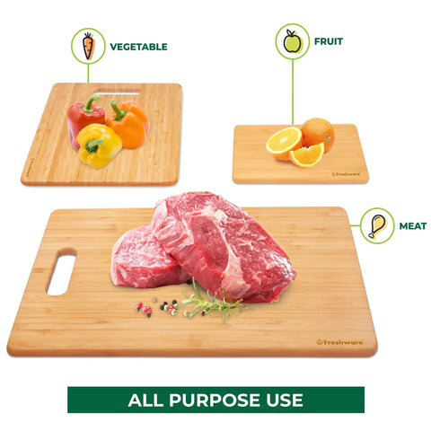 Bamboo Cutting Board Set of 3 for Kitchen with meat, vegetables, and fruit displayed on lightweight wood prep boards with hanging hole.