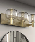 Vintage Refined Bathroom Vanity Light With Brushed Brass Finish, Clear Glass Globe Shades, 21 Inch Three Light G9 Fixture