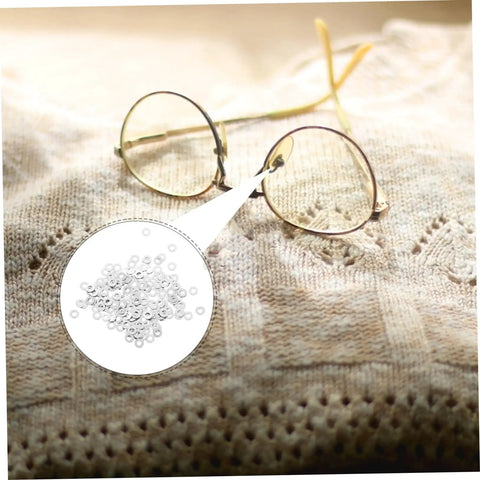 Heavy Duty Metal Eyeglass Screw Washers For Frameless Glasses Repair Kit With 200 Pieces Nut Washers shown on knit fabric