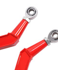 Red Rear Radius Arms For Polaris RZR XP 1000 And XP 4 1000 Beefy Heavy Duty Steel With Adjustable Heim Joints, High Clearance, Boxed Design For Maximum Tire Grip, Precise Suspension Geometry And Smoother Off Road Handling. Close-up of red steel rear radius arms with heim joints