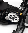 Close-up of 36T aluminum spur gear installed on Losi 1 24 Micro B Micro T 2WD RC car for smooth power transfer and durability.