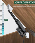 JiGiU 12V black linear actuator with mounting brackets, 100mm stroke, installed on a wooden cabinet door