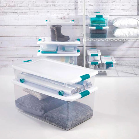 Super Tight Fit 64 Quart Clear Plastic Storage Bins 72 Pack With Snappy Hinged Lids stacked in a tidy arrangement showcasing winter boots and blankets.