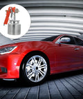 Slick Pneumatic Paint Sprayer Set For Car Body And Interior Walls And Furniture And Craft Projects delivering smooth even coverage beside a red car.