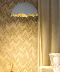 Modern Semicircle Pendant Light With Eggshell Chandelier Design For Bedroom Dining Room And Cafe hanging against herringbone wall.