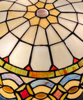 Close-up of Tiffany Style Stained Glass Ceiling Light 3 Light Fixture 16 Inch Flush Mount Lit Vintage Vibe For Bedroom.
