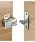 Cool 10 Pack Cabinet Latch Catches With Built-in Spring Auto Locks To Secure Wardrobes Cupboards And Kitchen Drawers Perfect For Hardware Fittings And Easy Setup On Any Home Makeover Project Today - silver metal catch close-up on wooden cabinet doors.