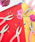 Five Pack Handheld Hole Punch Set With Metal Punches In Circle Heart And Star Shapes for DIY crafts, shown with paper confetti