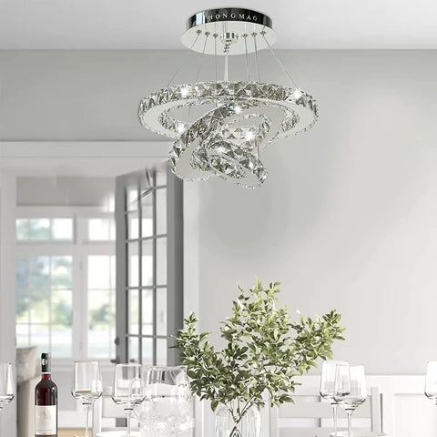 Slick Modern Crystal LED Chandelier With Adjustable Stainless Steel Rings Three Ring Pendant Lights For Living Room Dining Room And Bedroom Chrome Finish 75W 85 To 265V White To Warm White LED in dining room setting