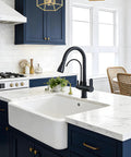 Kitchen Faucet 0196R in black finish above a modern farmhouse sink with a marble counter in a stylish kitchen.