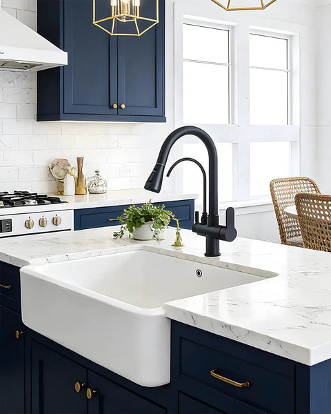Kitchen Faucet 0196R in black finish above a modern farmhouse sink with a marble counter in a stylish kitchen.