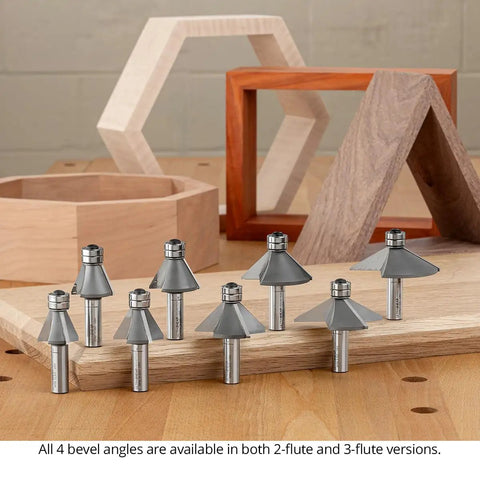 Pro Grade Four Piece Chamfer Router Bit Set With Carbide Cutters And Twin Bearings For Swift Bevels and Dead On Miter Joints At 22.5 30 45 60 Degrees, displaying various angles on a wood surface.