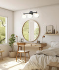 Room with Black And Gold Lit Three Light Vanity Light Fixture For Bathroom Mid Century Modern Wall Sconce Over Mirror.