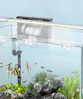 Top Shelf Aquarium Lid Clips For Rimless Glass Tanks Heavy Duty Acrylic Fish Tank Hardware Smooth Install and Secure Lock No Sweat Setup Includes Six Pieces installed on a rimless aquarium.