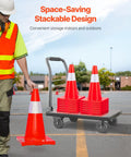 Worker stacking Six Pack 28 Inch Orange Traffic Cones With Reflective Collar Heavy Duty PVC Road Safety Cones on a cart