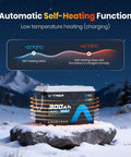Self Heating LiFePO4 Battery With App Monitoring, 12.8V 300Ah, 3840Wh, Built In 200A BMS, on snowy mountain rock