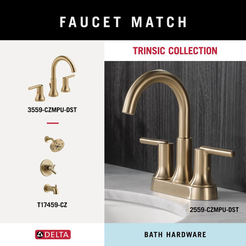 Trinsic Collection bathroom faucet in bronze finish on marble sink with sleek design, matching bath hardware shown.