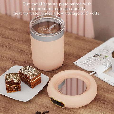 Keep Your Sip Fire All Day Long With This Game Changing Electric Mug Warmer featuring a metal plate and aluminum cup.