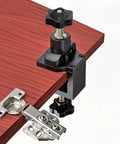 4-pack black 3/8-16 star knob clamps installed on a woodworking jig.