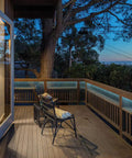 Outdoor deck with chair and evening view, ideal for under cabinet lighting with Universal 120 Watt Dimmable 12V DC LED Driver.