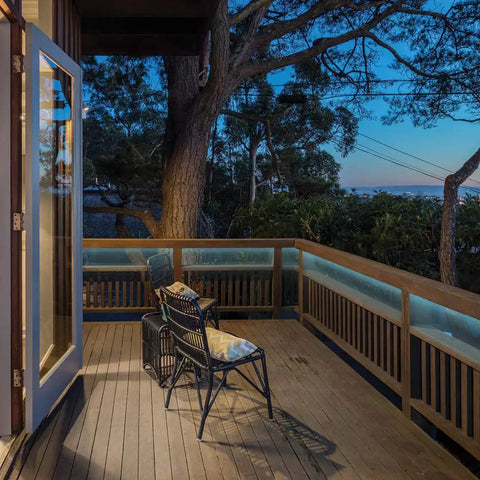 Outdoor deck with chair and evening view, ideal for under cabinet lighting with Universal 120 Watt Dimmable 12V DC LED Driver.