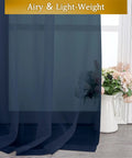Close-up of navy blue semi-sheer voile curtains showcasing fabric texture with a floral vase near window, Pure Sheer Window Curtains 72 Inch Long 2 Panels Navy Blue Voile Drapes For Bedroom And Living Room Semi Sheer Rod Pocket Curtains 40 Inch Wide Each Total 80 Inches Width For Patio Yard Villa Parlor Cozy Window Treatments.