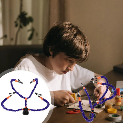 Child using Handy Third Hand Soldering Stand With Table Clamp Flexible Arm Soldering Holder for PCB repair and electronics assembly.