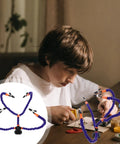 Boy using Adjustable Third Hand Soldering Station With Clamp And PCB Holder Blue Solder Tool for electronics repair