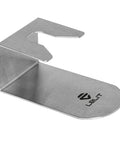 Heavy Duty Stainless Steel Espresso Tamping Stand Featuring Non Slip Base And Slick Brushed Finish on a barista countertop.