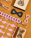 Dope Bow Shape Leather Cutting Die Set Two Pack for DIY leather projects with backpack strap punch molds on display