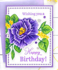 Handmade birthday card with purple flower illustration and 'Wishing you a Happy Birthday!' message on violet background.