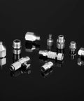 14 Piece Airbrush Adapter Set With Quick Disconnect Fittings And Quick Release Hose Connectors laid out on black surface