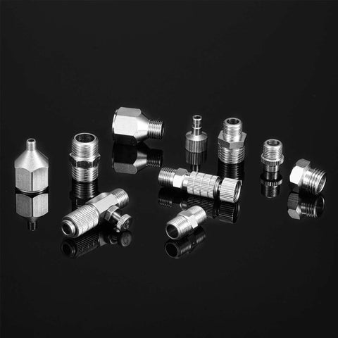 14 Piece Airbrush Adapter Set With Quick Disconnect Fittings And Quick Release Hose Connectors laid out on black surface